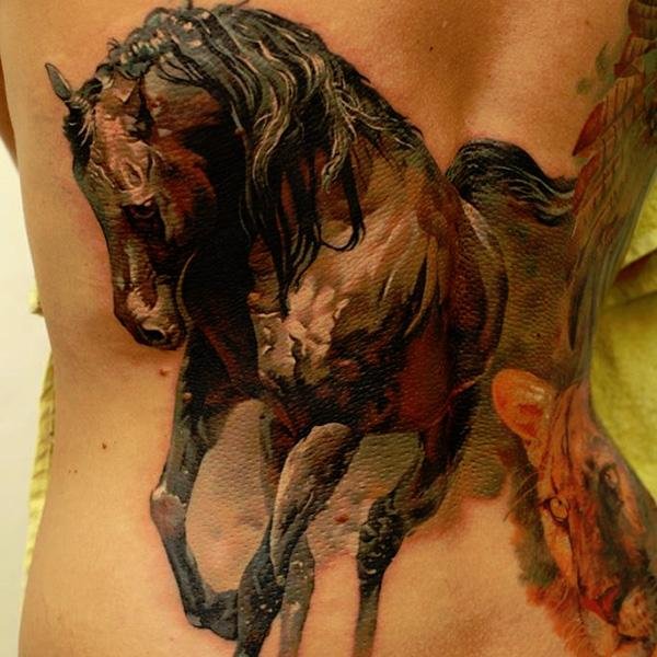 Татуировка с изображением лошади: значение и особенности